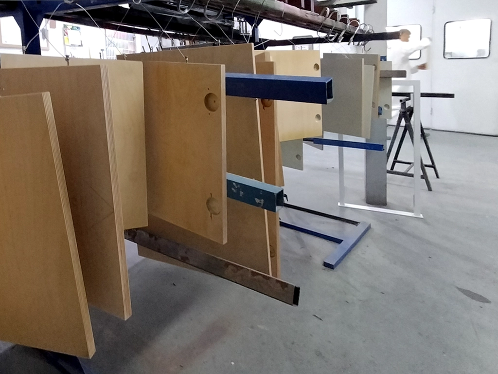 Secado puertas vitrina expositiva botiga COAC proyecto ESSA PUNT