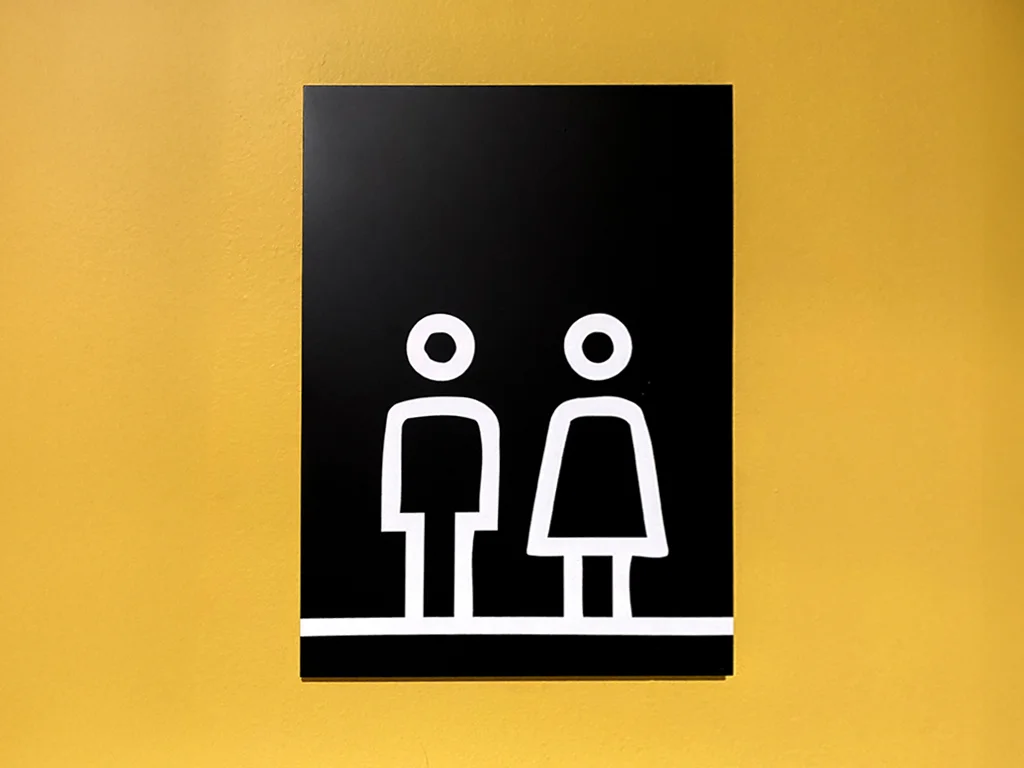 Senyalística WC banys del Nhotel Indigo projecte ESSA PUNT